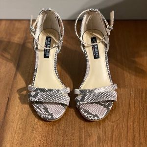 Strapped snake skin wedges